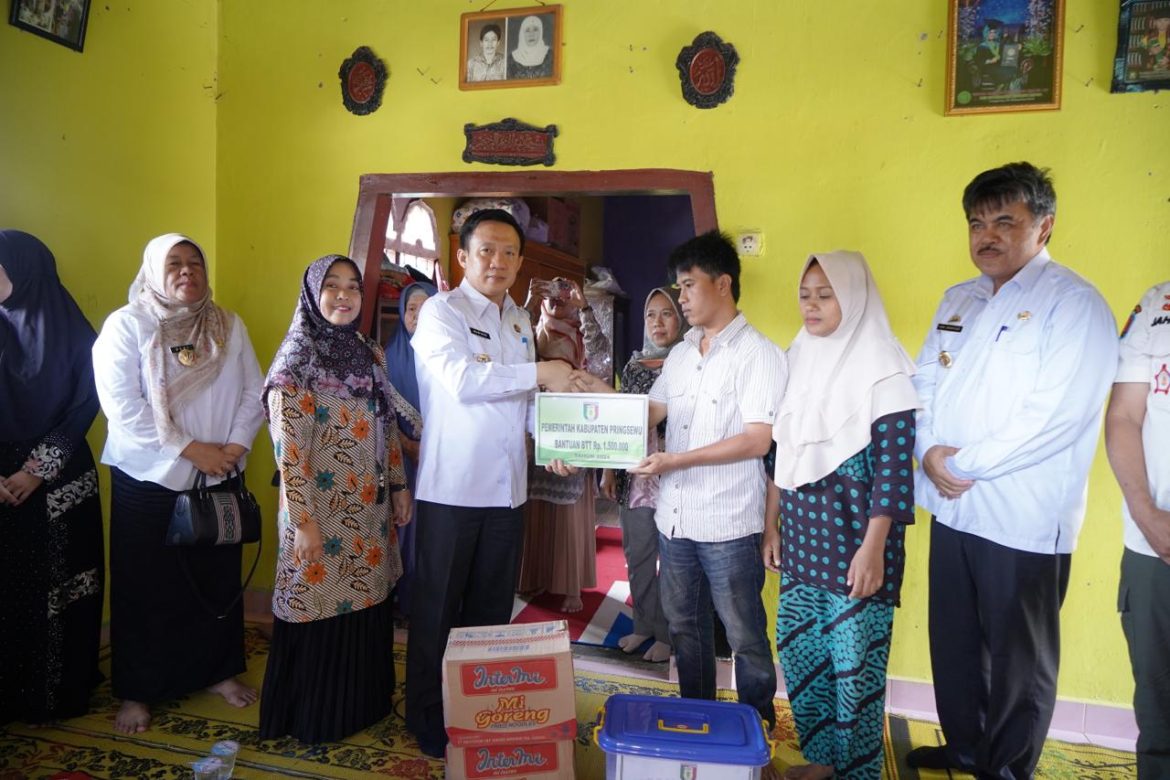 Pj.Bupati Pringsewu Serahkan Taliasih Korban Tenggelam di Sungai & Lakalantas 