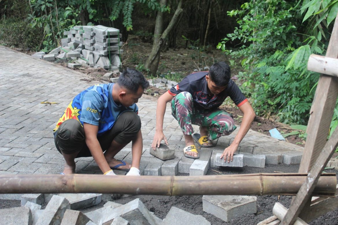 Satgas TMMD Kodim Pasuruan Hampir Rampungkan Pembangunan Jalan Paving Desa Kalipang