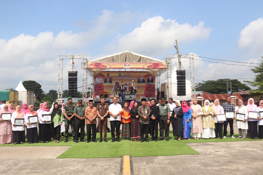 Pemkab Paluta Raih Rekor Muri Menari Tortor Naposo Nauli Bulung Dengan Peserta Terbanyak 
