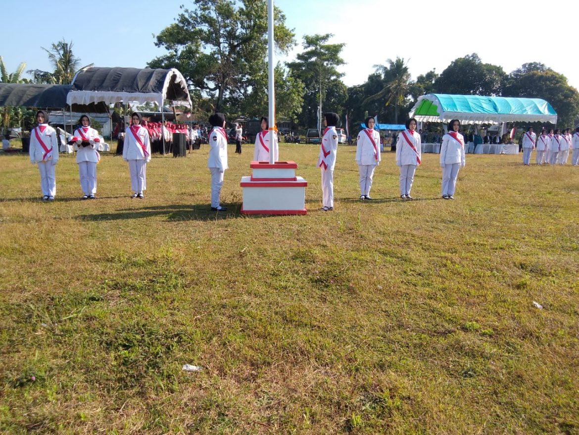 Babinsa Clering Hadiri Upacara HUT ke-80 RI di Lapangan Desa Clering, Donorojo