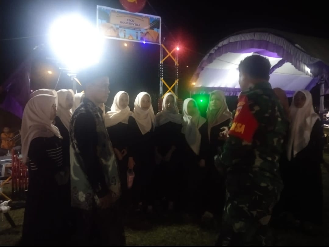 Latih Disiplin dan Kepemimpinan Sejak Dini, Babinsa Bandungharjo Hadiri Kemah Bakti Darul Ulum